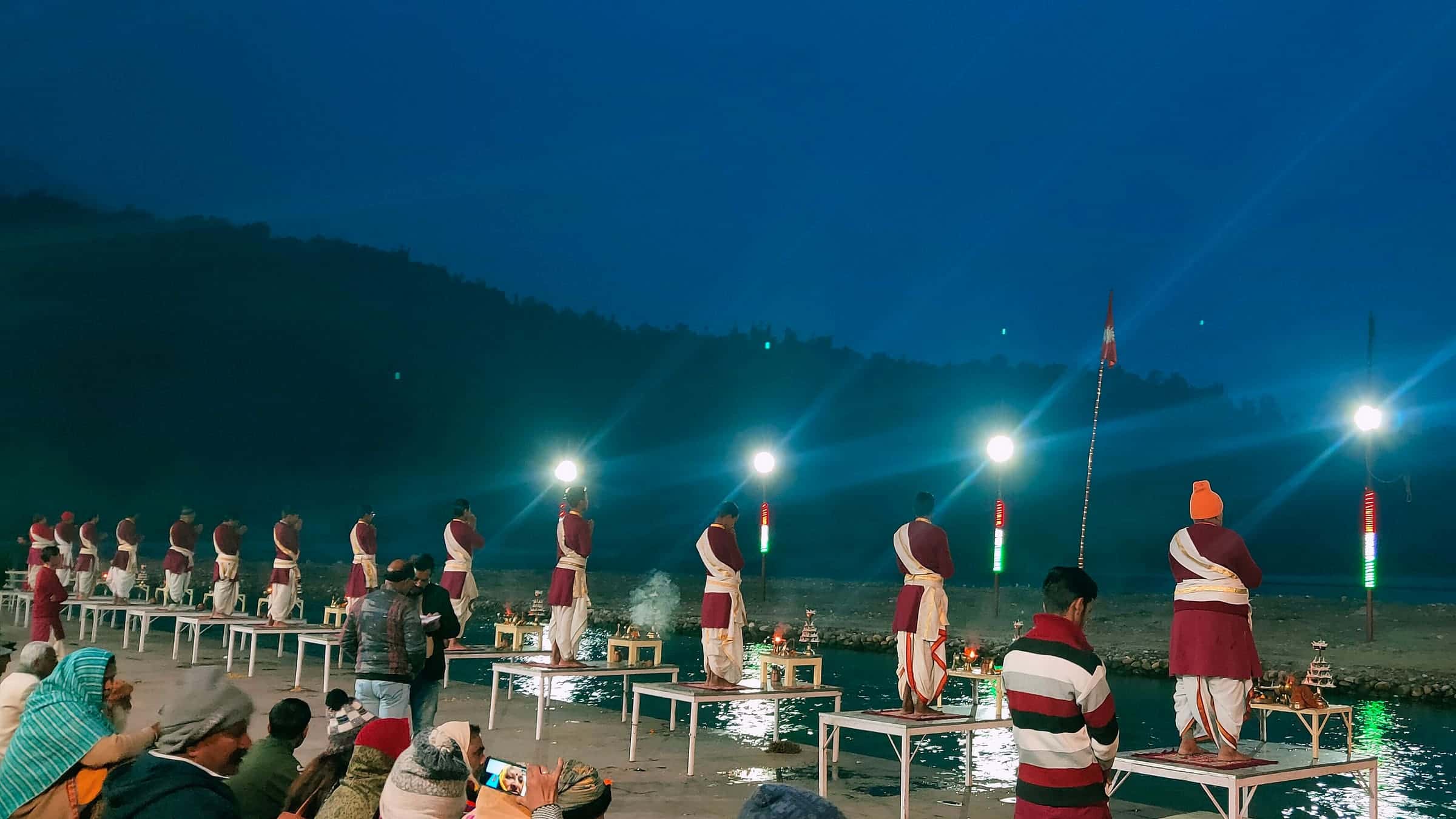 Priests performing the evening Ganga Aarti at Triveni Ghat, Rishikesh