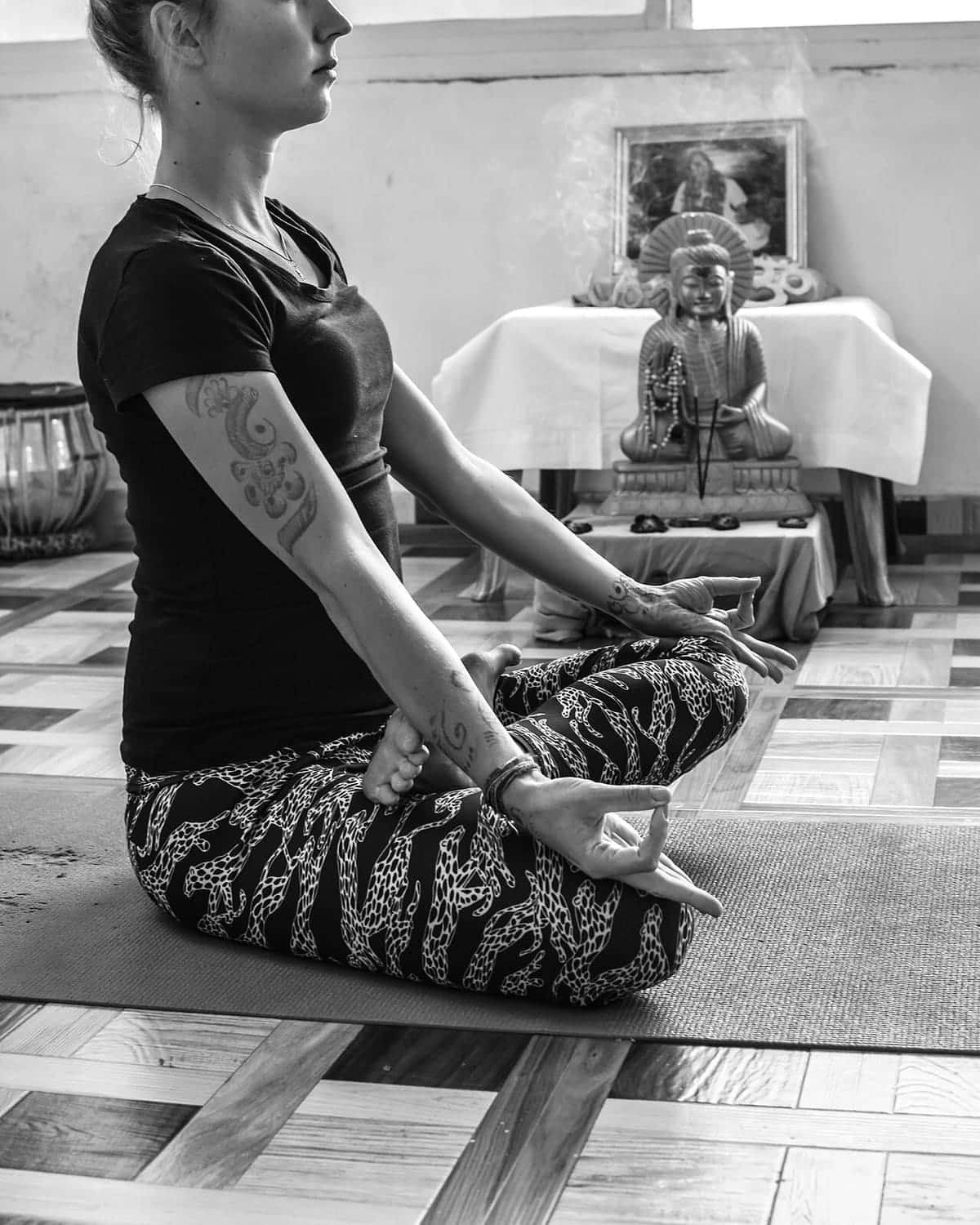 Seated meditation practice in a yoga studio in Rishikesh